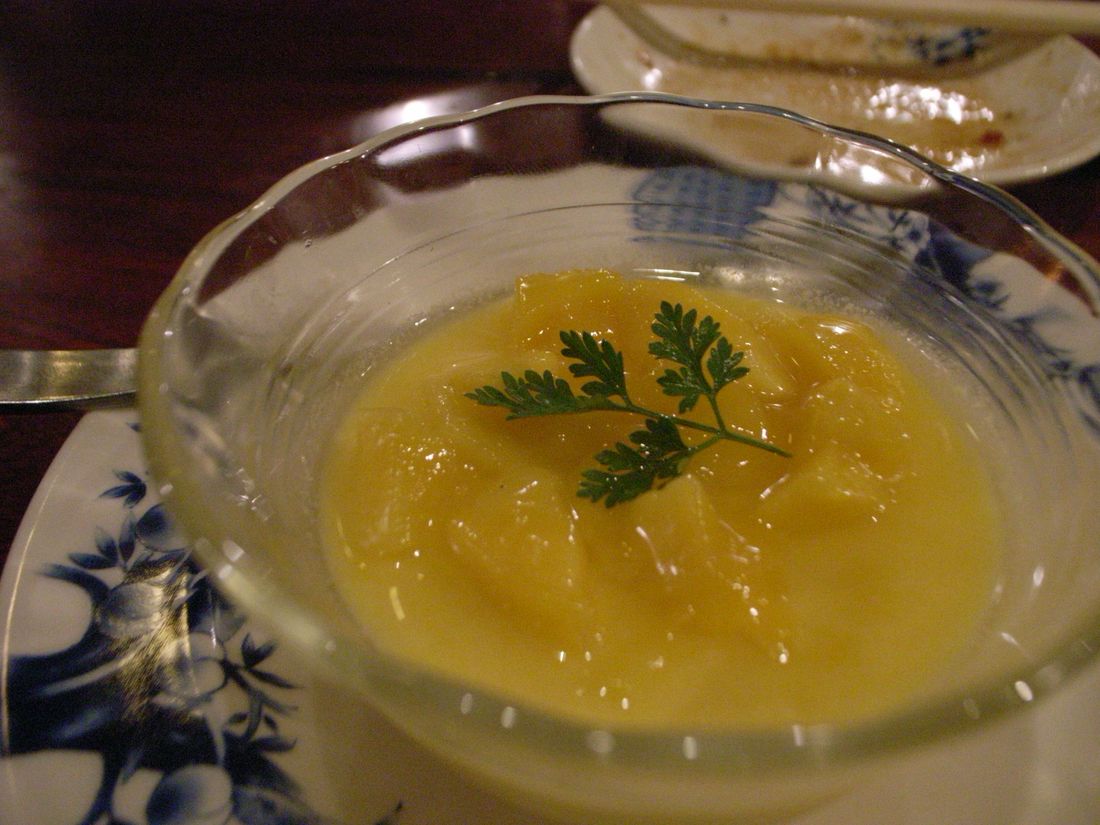 Chilled mango pudding with fresh mango cubes